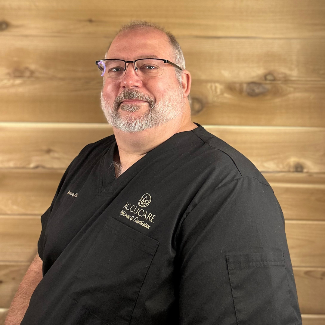 “Shane Carllson, RN at Accucare Wellness & Aesthetics—Navy veteran and experienced nurse dedicated to compassionate, expert care.”